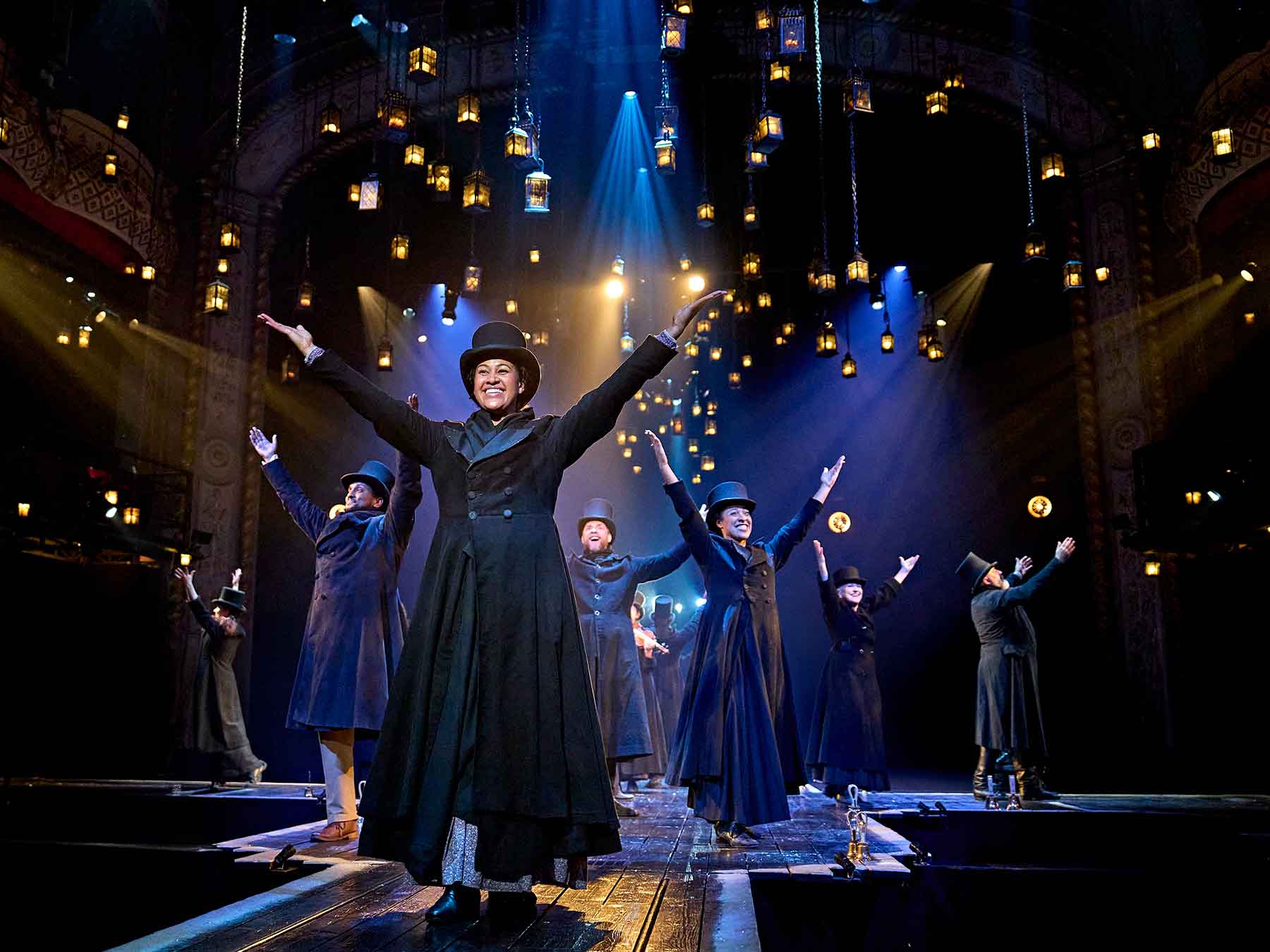 Kimmy Edwards (Mrs Cratchit) and the Company in A Christmas Carol at The Old Vic (2024). Photo by Manuel Harlan