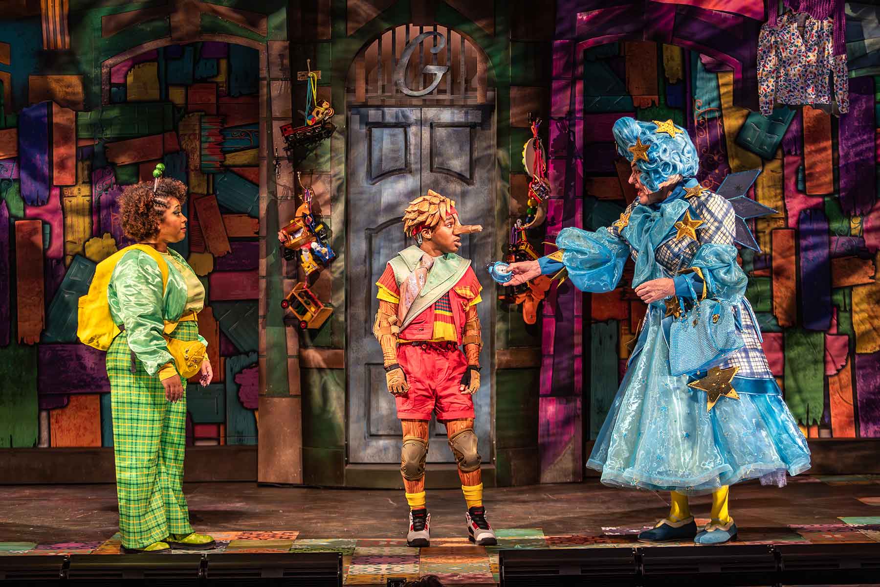 Nicole Louise Lewis, Dylan Collymore and Michael Bertenshaw in Pinocchio at Stratford East (c) Craig Fuller